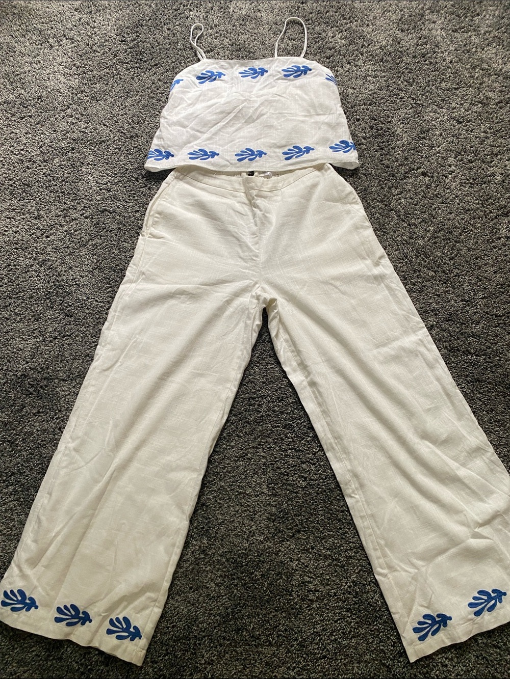 vestique White Wide-Leg Pants with Blue Embroidered Hem
